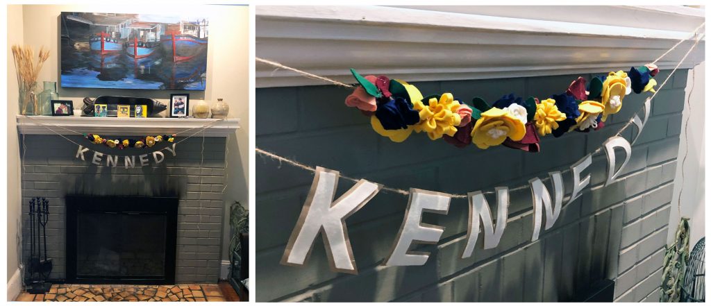 Felt flower garland and name banner for a birthday party.